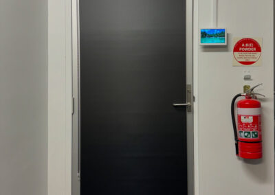 Blockout Blind for an internal building door with a glass panel to provide essential privacy for a classroom door.
