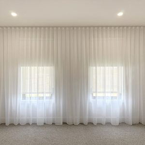 Sheer Curtains combined with blockout blinds with Centre Opening for a Master Bedroom in a newly built house in Chirnside Park.